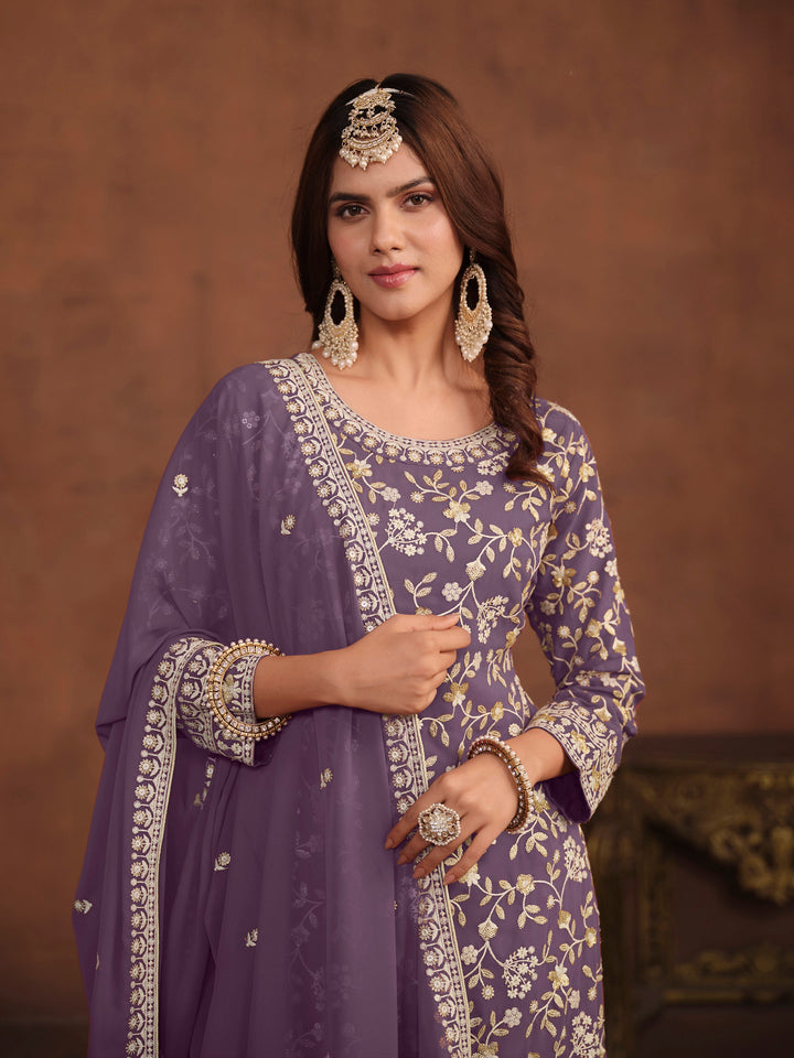 Traditional purple faux georgette salwar kameez, detailed embroidery with sequins, ideal for USA occasions.