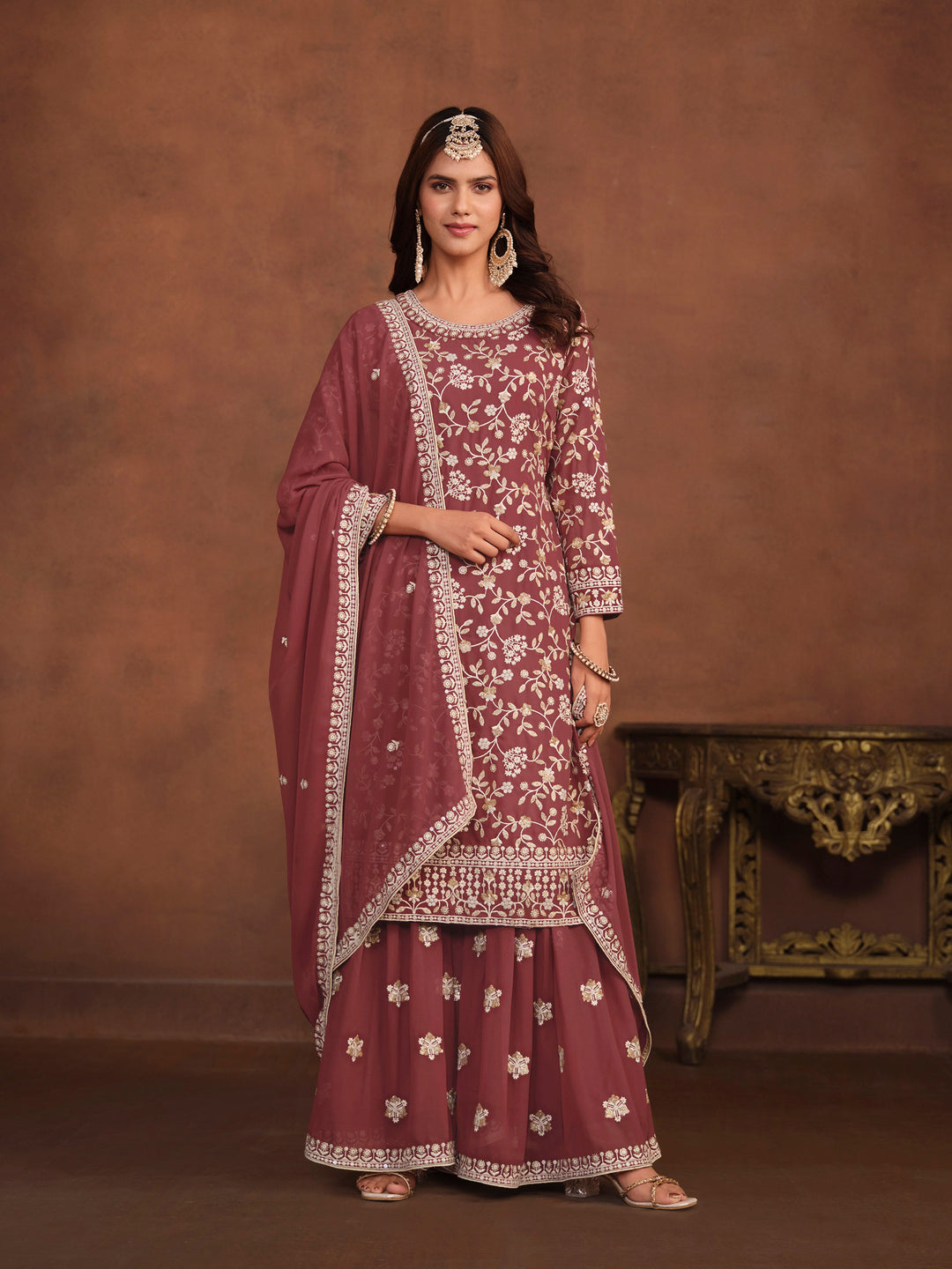 Elegant brick faux georgette salwar kameez with heavy thread embroidery and sequins, ideal for USA fashion.