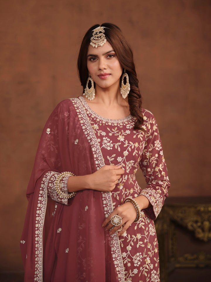 Traditional brick faux georgette salwar kameez, detailed embroidery and sequins for USA occasions.