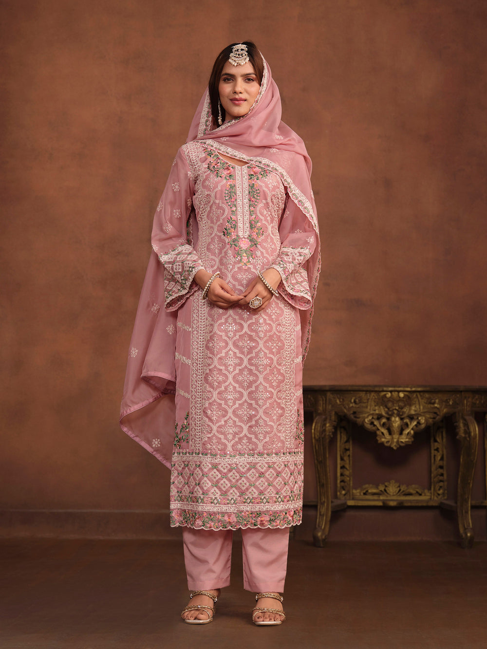 Baby pink soft organza salwar kameez with intricate thread embroidery and sequins work, stylish for USA events.