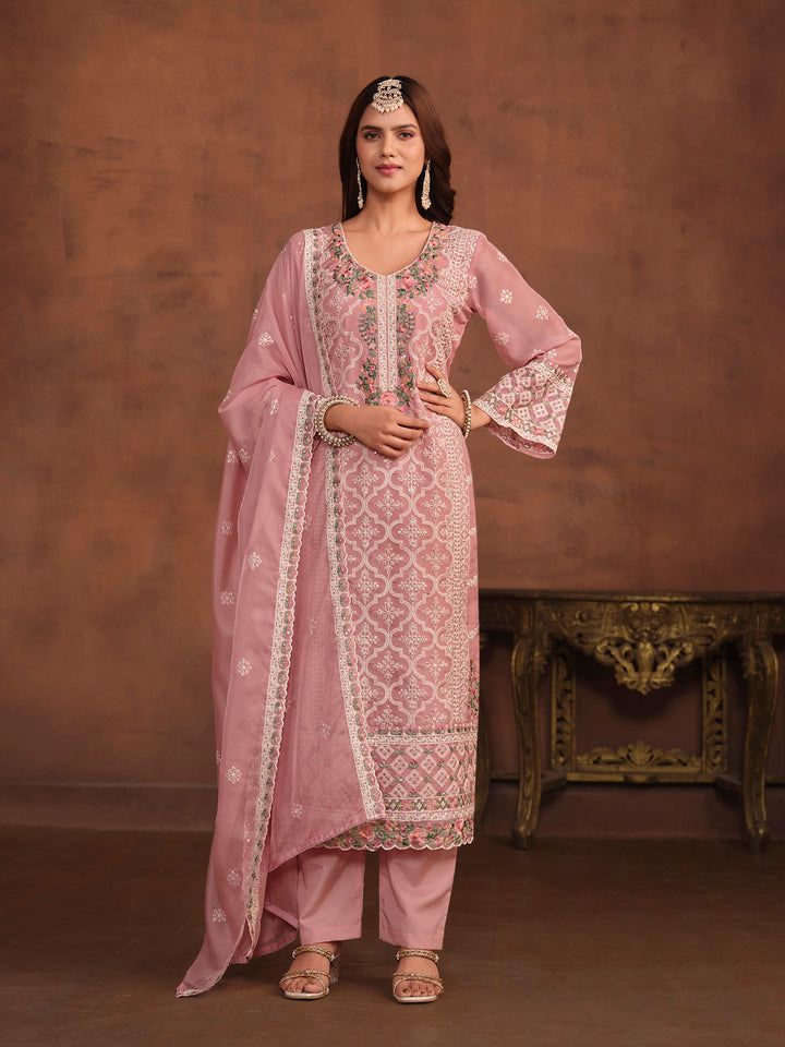 Elegant baby pink soft organza salwar kameez with heavy thread embroidery and sequins, perfect for USA fashion.