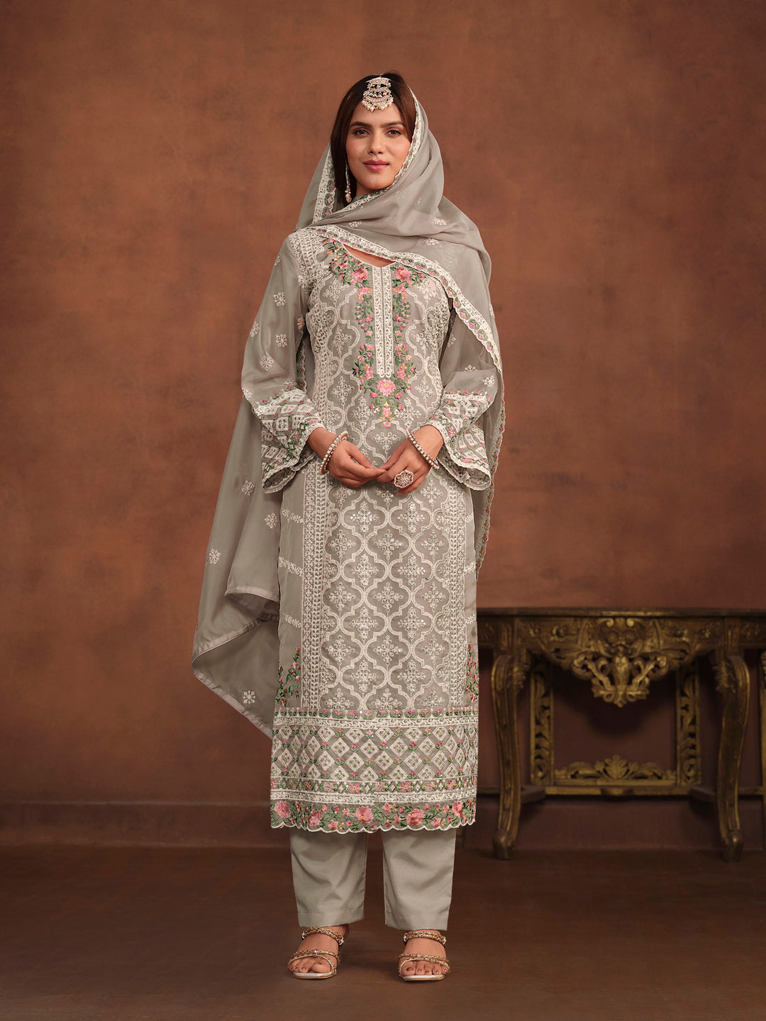 Grey soft organza salwar kameez with intricate thread embroidery and sequins work, perfect for USA events.