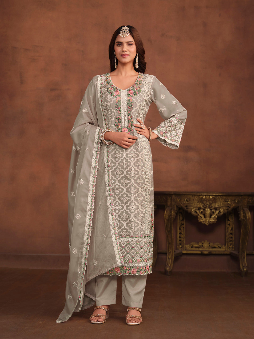 Elegant grey soft organza salwar kameez with heavy thread embroidery and sequins, ideal for USA fashion.