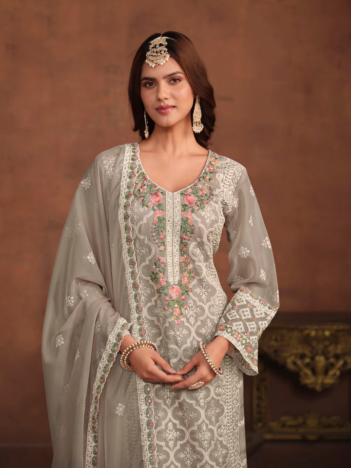 Designer grey salwar kameez in soft organza, featuring heavy embroidery and sequins for USA customers.