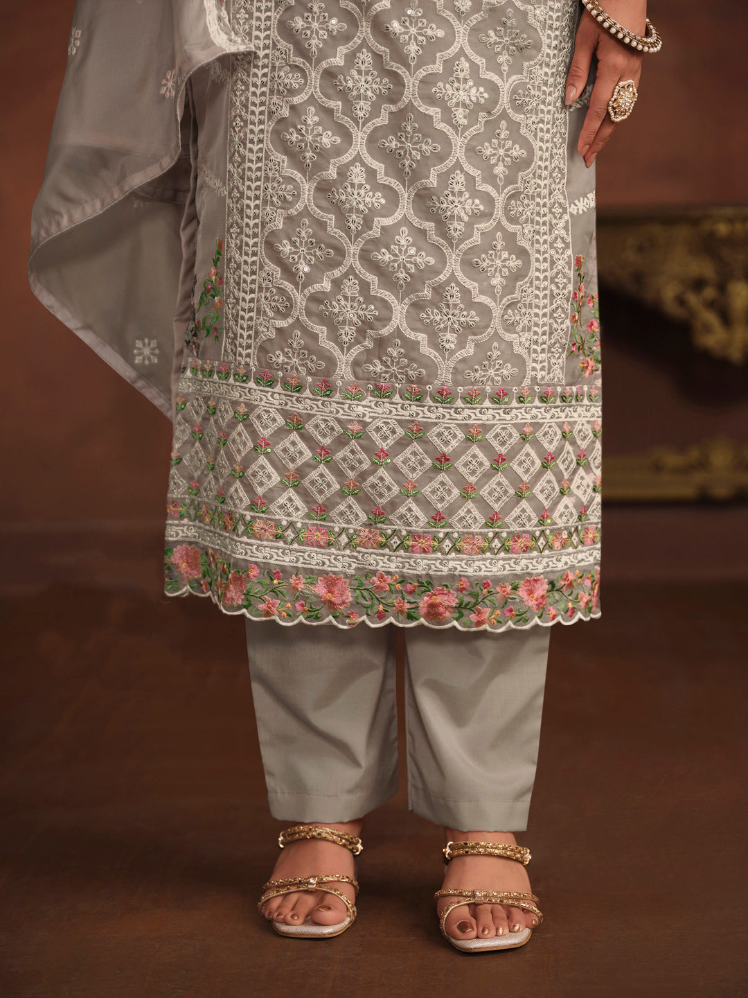 Traditional grey organza salwar kameez with detailed embroidery and sequins, stylish choice for USA occasions.