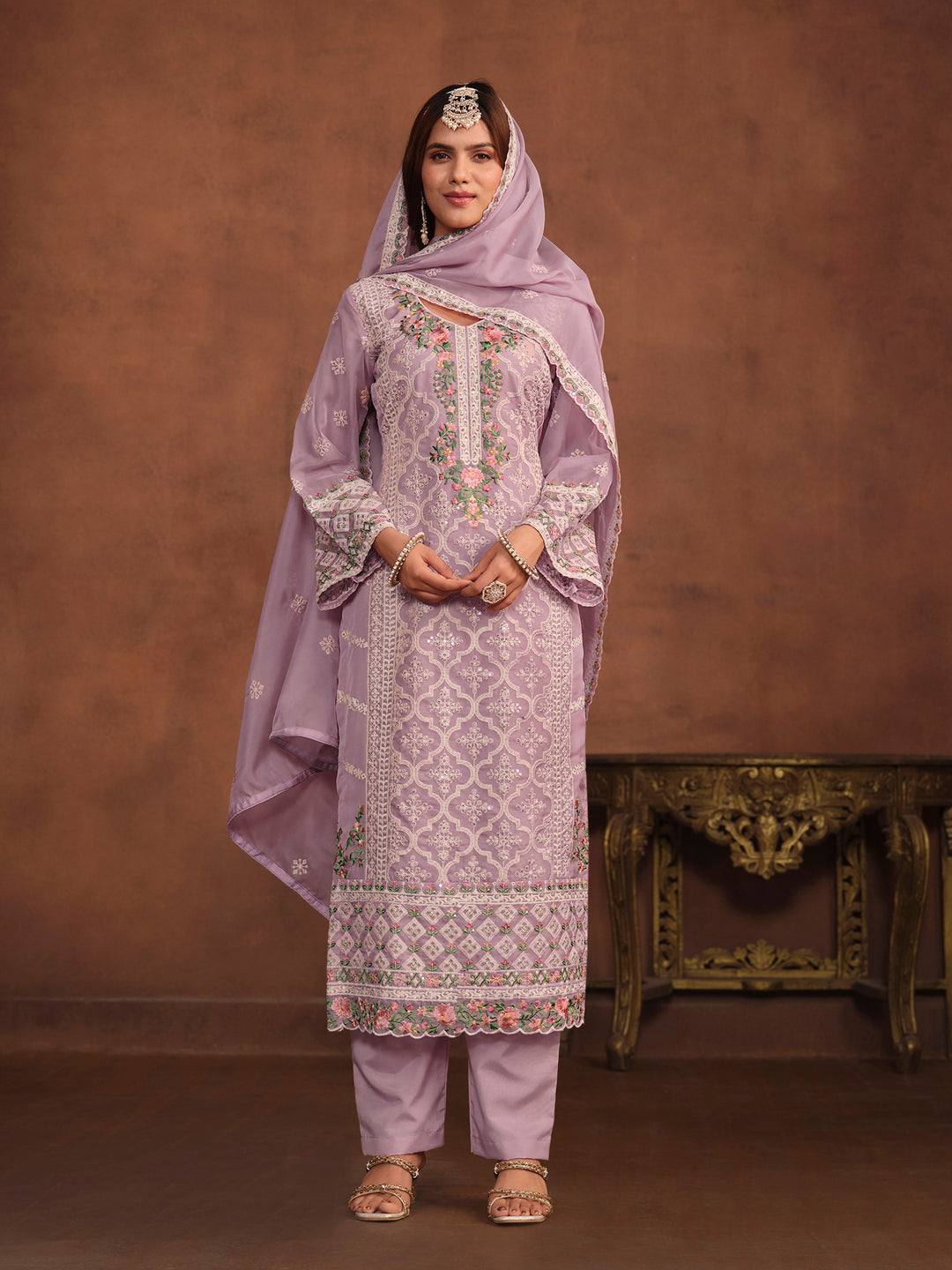 Lavender soft organza salwar kameez with intricate thread embroidery and sequins, stylish for USA events.