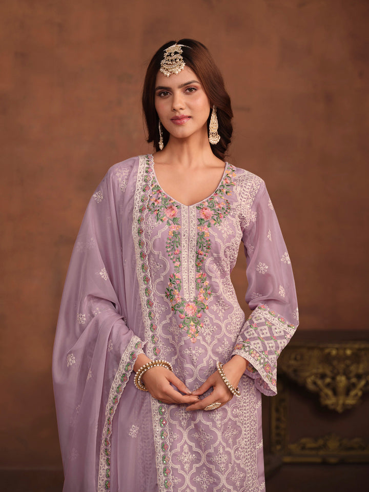 Designer lavender salwar kameez in soft organza, featuring heavy embroidery and sequins for USA customers.