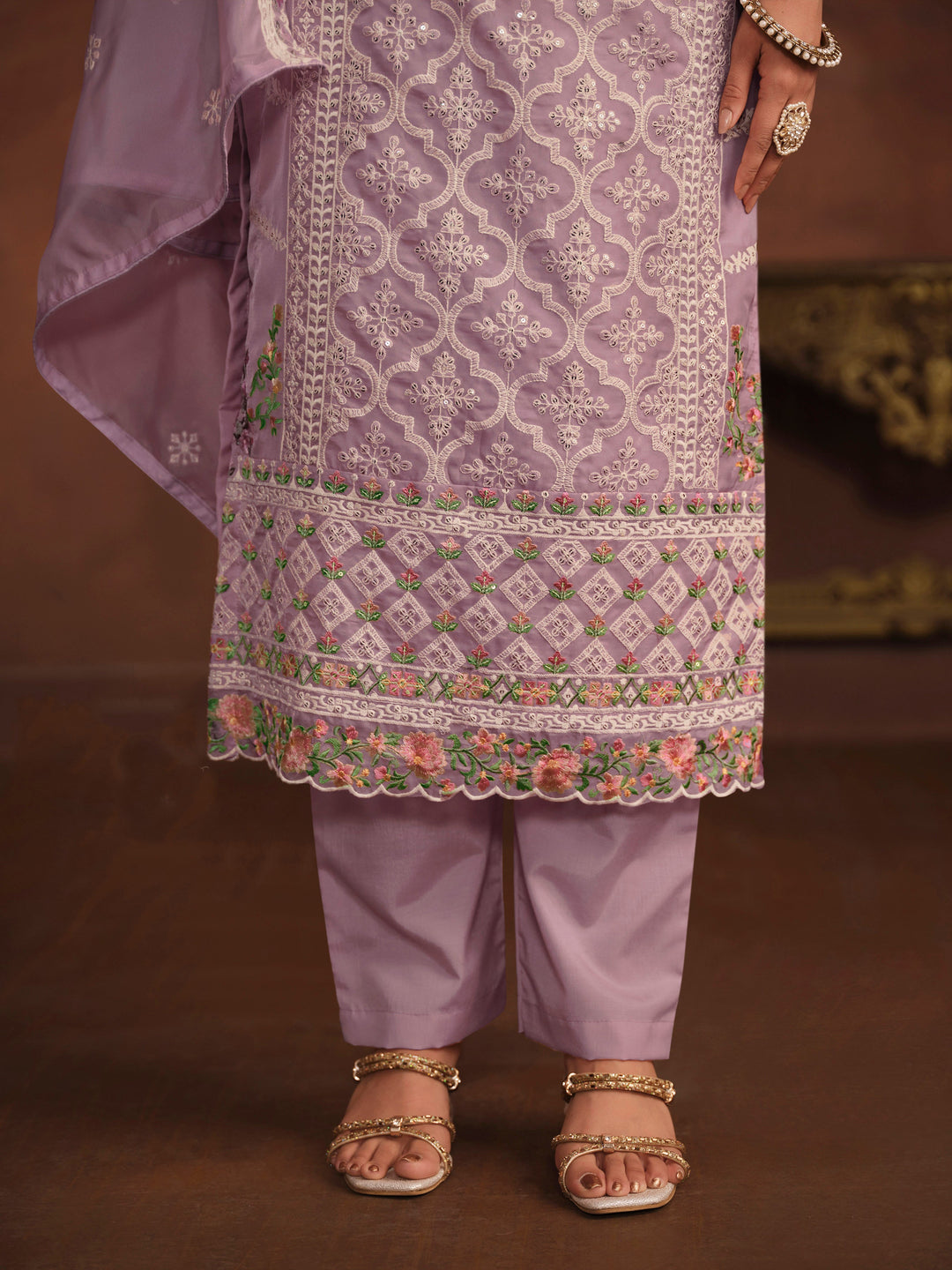 Traditional lavender organza salwar kameez, detailed embroidery and sequins work, ideal for USA occasions.