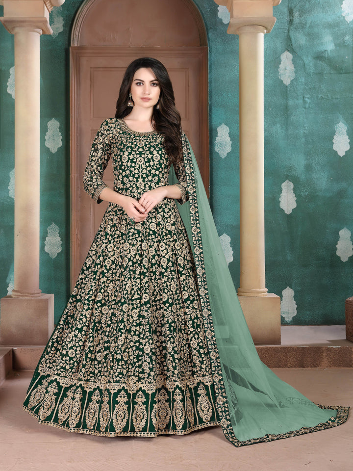 Vibrant green party wear salwar kameez featuring exquisite embroidered details, perfect for festive celebrations.