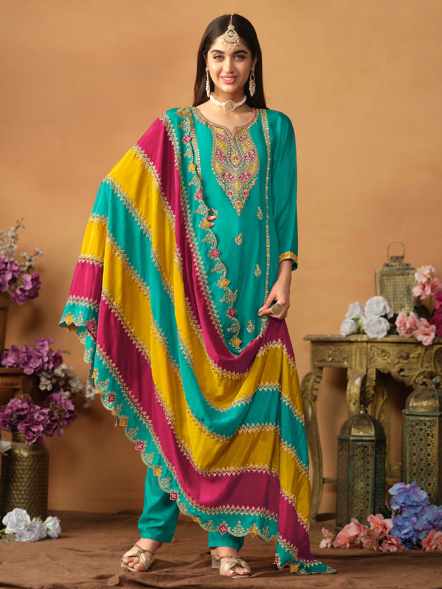 Stunning teal green chinon silk salwar kameez featuring heavy thread embroidery and sequins, perfect for festive occasions.