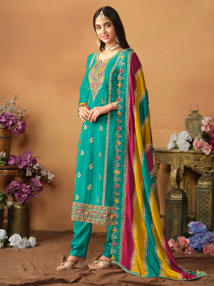 Elegant teal green salwar kameez in chinon silk with intricate thread embroidery and shimmering sequin work for special events.