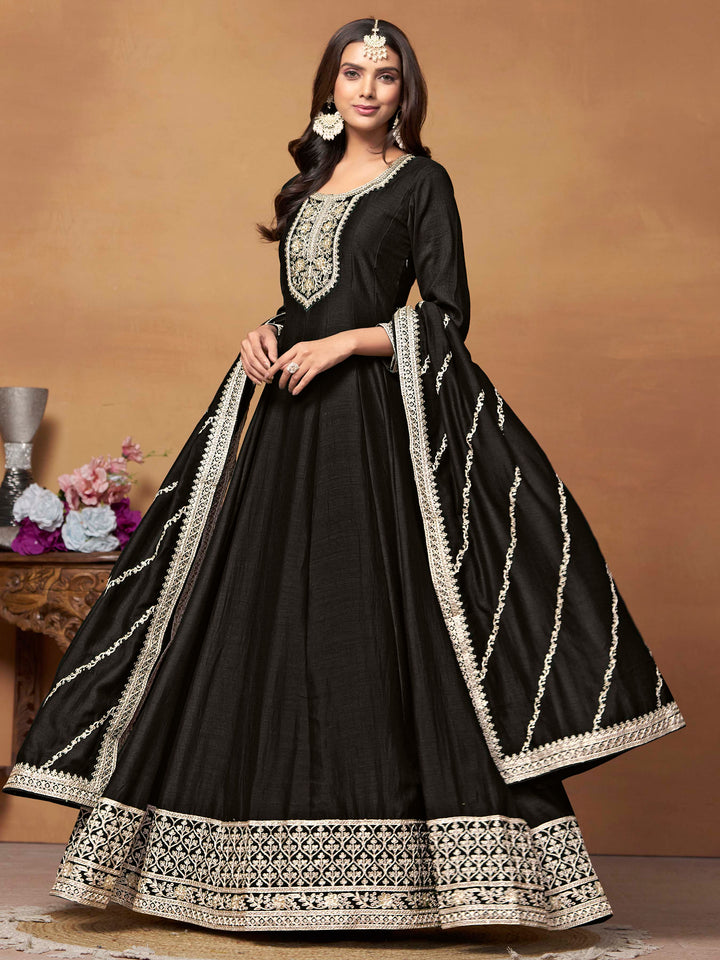 Stunning black salwar kameez in art silk with intricate thread embroidery and shimmering sequin work for special events.