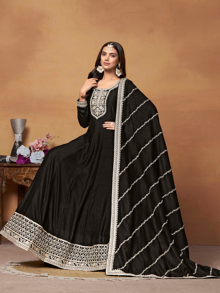 Beautiful black salwar kameez crafted from art silk, showcasing intricate heavy thread and sequin embellishments.