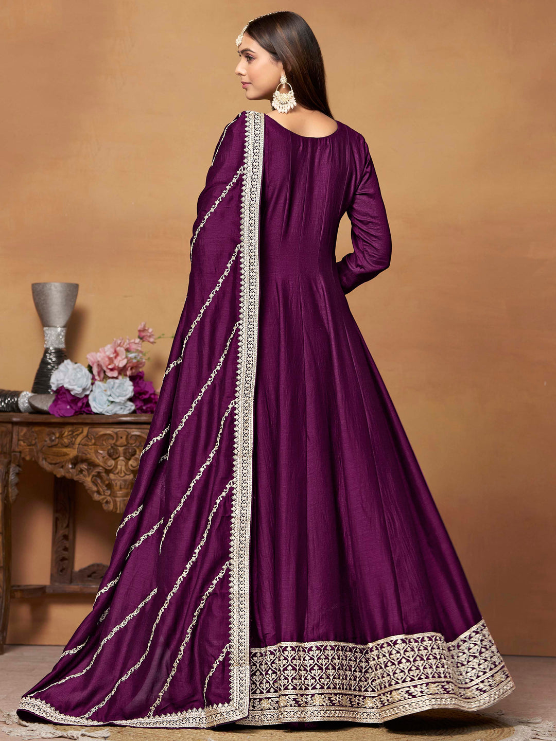 Luxurious magenta art silk salwar kameez adorned with exquisite heavy embroidery and sequins, ideal for weddings.