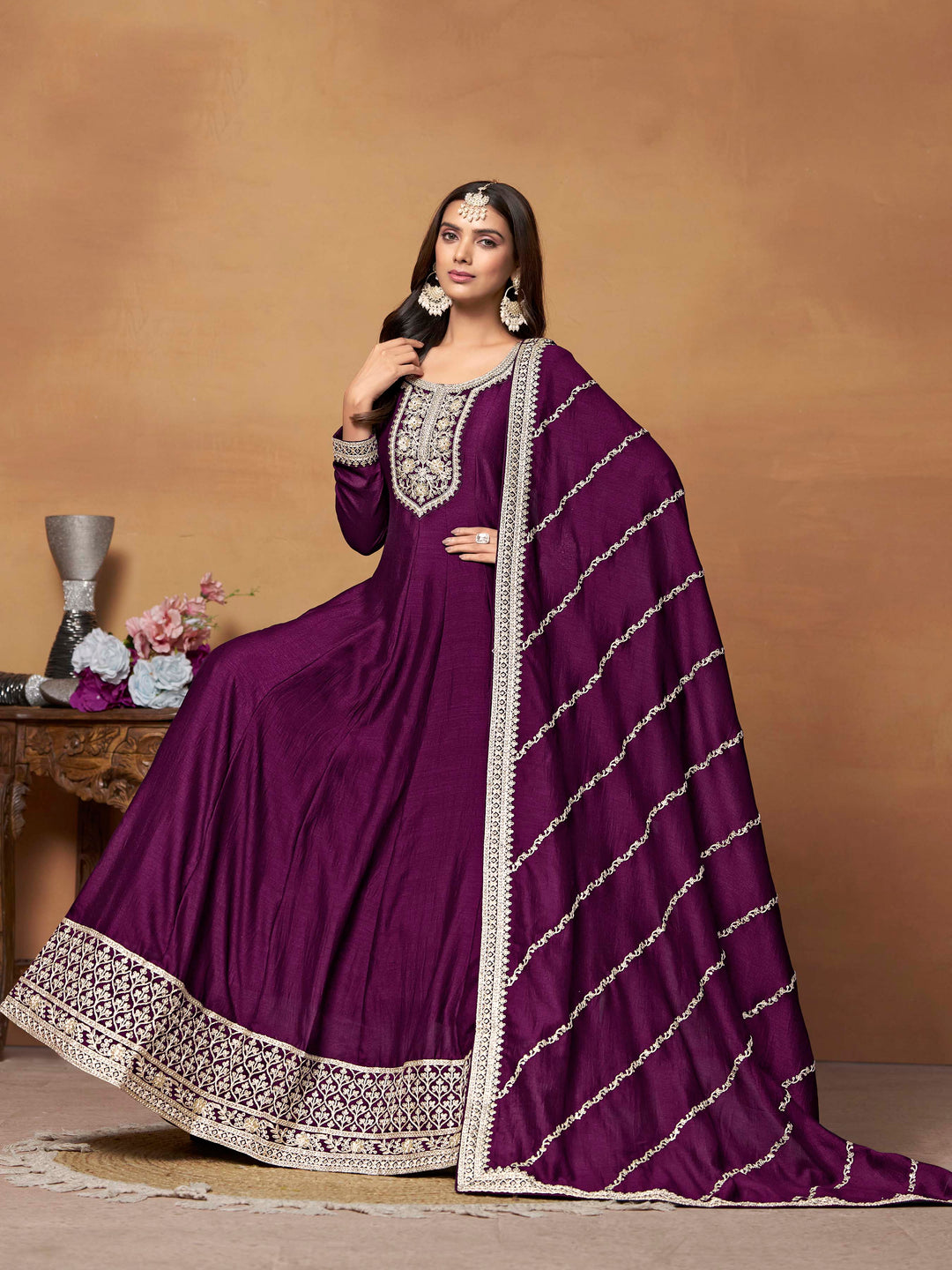 Beautiful magenta salwar kameez crafted from art silk, showcasing intricate heavy thread and sequin embellishments.