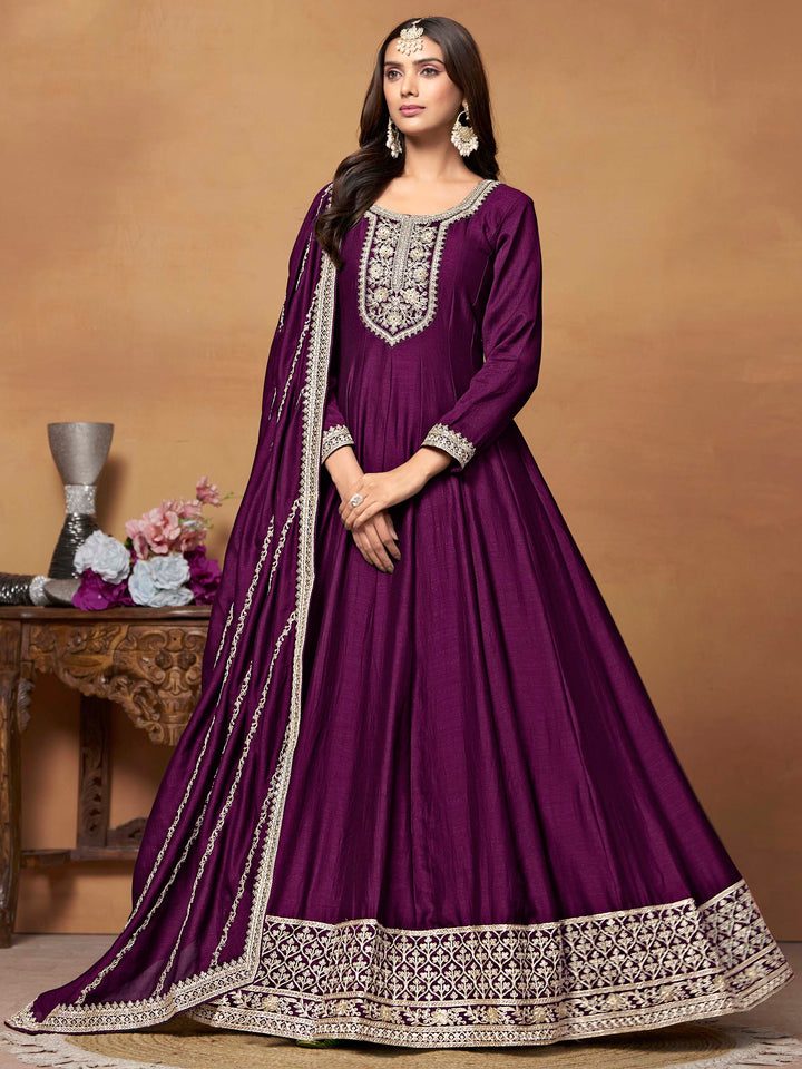 Stunning magenta art silk salwar kameez featuring heavy thread embroidery and sequins, perfect for festive occasions.