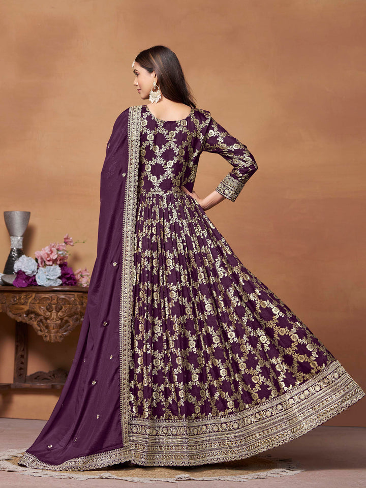 Luxurious purple dola jacquard salwar kameez adorned with beautiful embroidery, perfect for weddings.