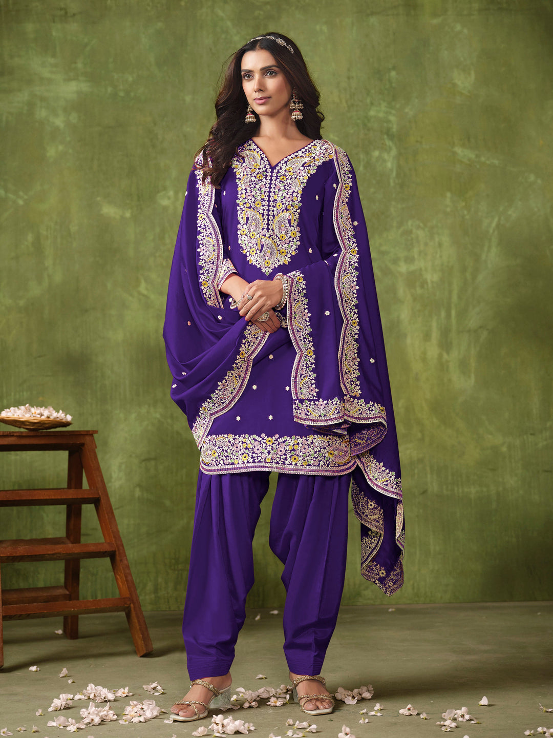 Gorgeous royal blue Roman silk salwar kameez featuring stunning heavy thread embroidery and sequins, perfect for special occasions.