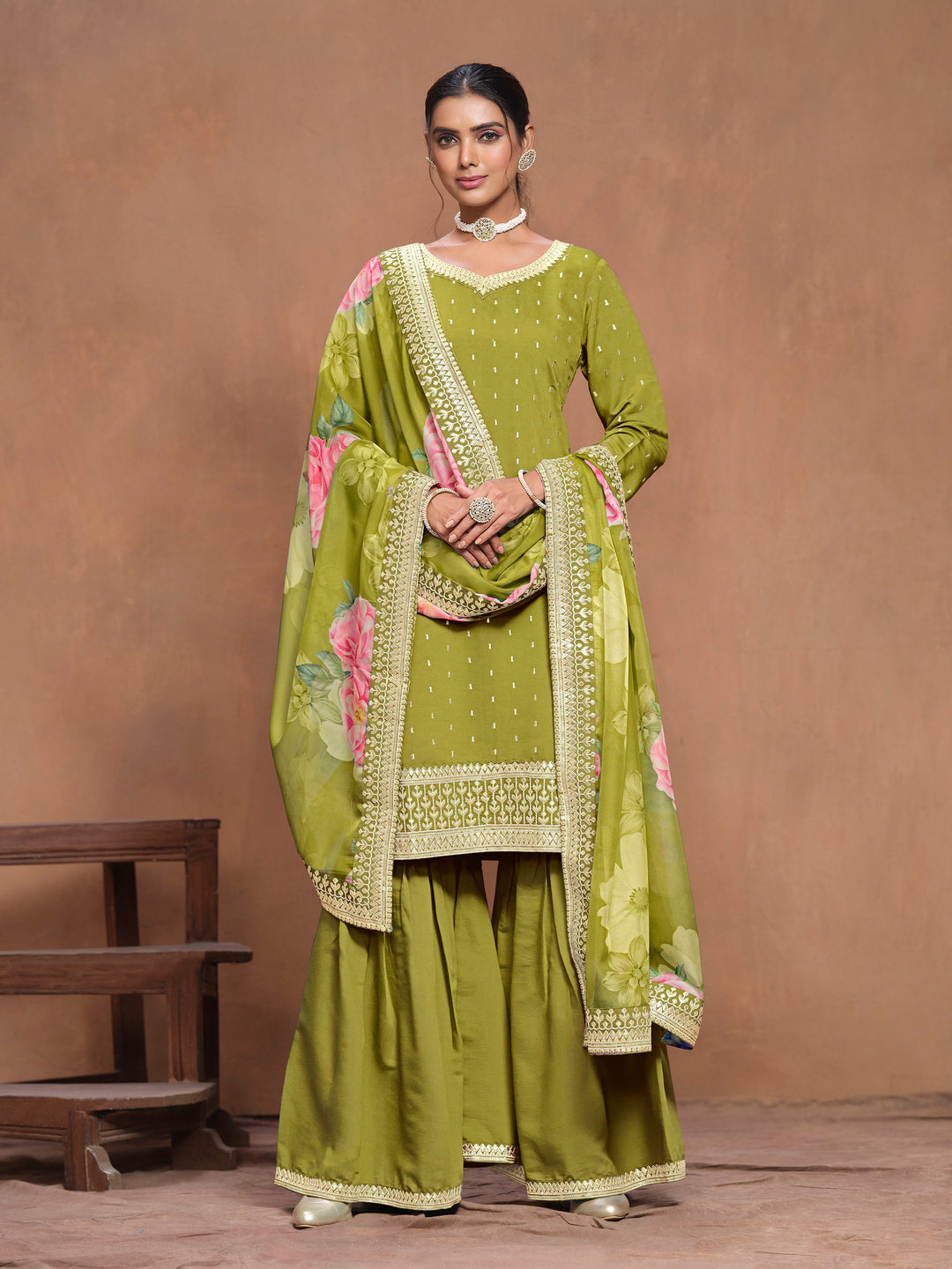 Elegant Mehendi Roman silk salwar kameez adorned with heavy thread embroidery and a vibrant printed dupatta, perfect for festive occasions.