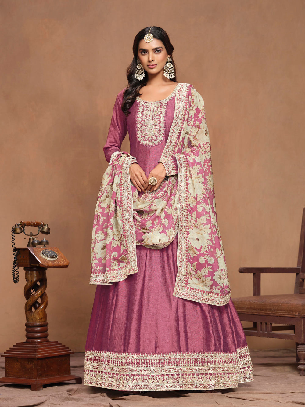 Gorgeous hot pink art silk salwar kameez adorned with exquisite heavy thread embroidery and sequins, ideal for weddings and celebrations.