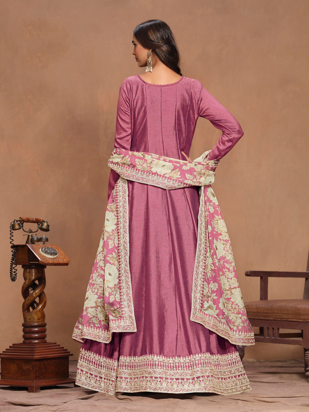 Elegant hot pink art silk salwar kameez showcasing beautiful heavy thread embroidery with sequins work and a stylish printed dupatta.