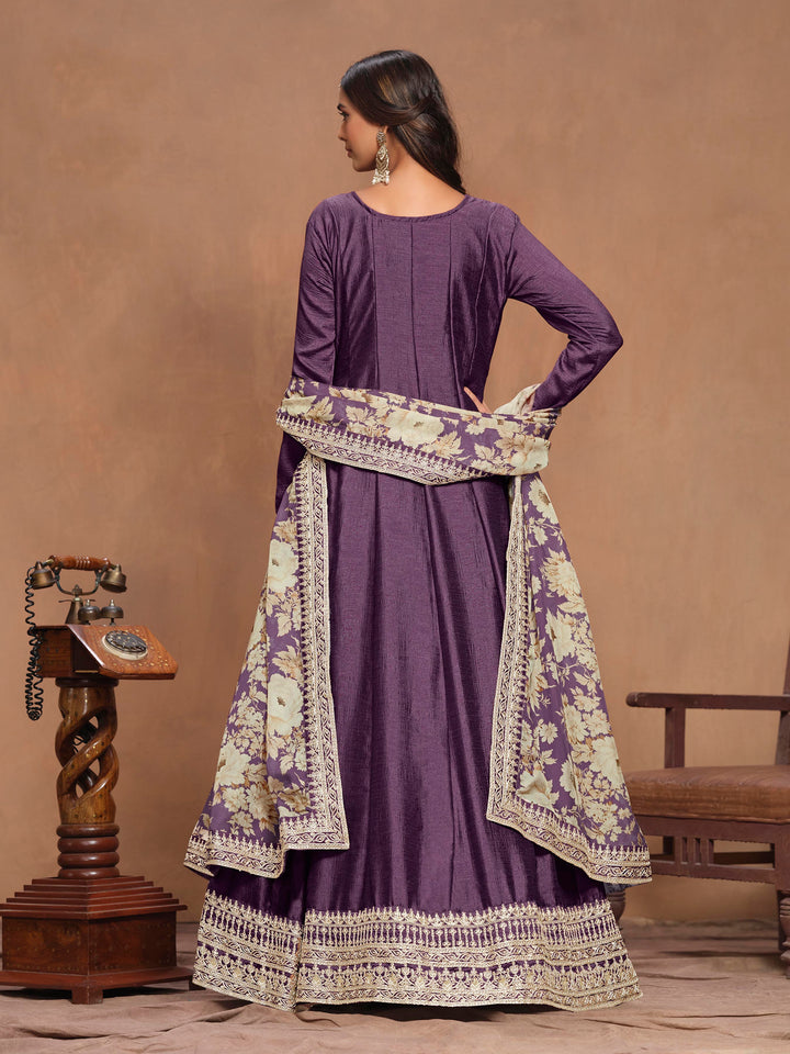 Stunning purple art silk salwar kameez showcasing beautiful heavy thread embroidery with sequins work and a vibrant printed dupatta.