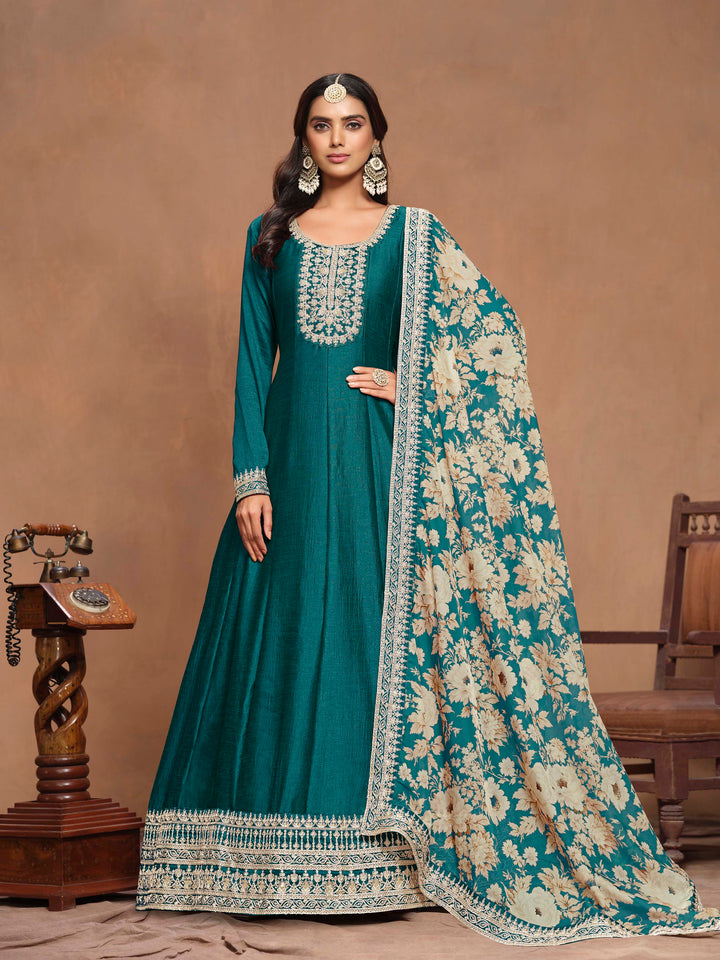 Beautiful teal art silk salwar kameez featuring intricate heavy thread embroidery with sequins work and a printed dupatta, perfect for festive occasions.