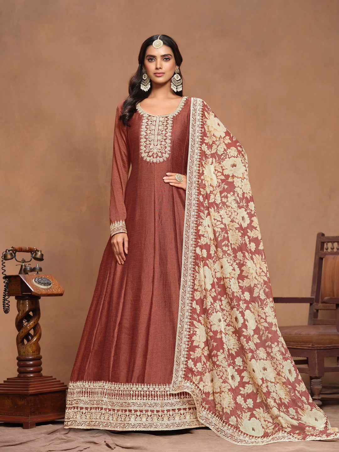 Elegant rust brown art silk salwar kameez featuring intricate heavy thread embroidery with sequins work and a stylish printed dupatta, perfect for festive occasions.