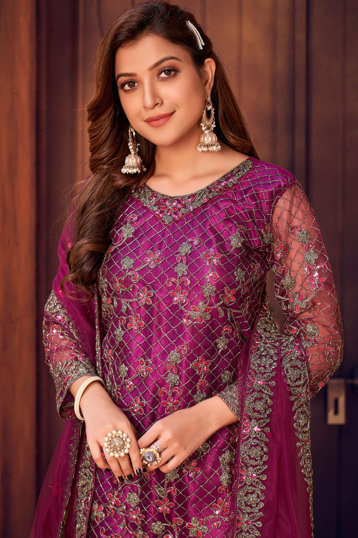 Glamorous magenta salwar kameez, perfect USA party attire for women, striking ethnic style.