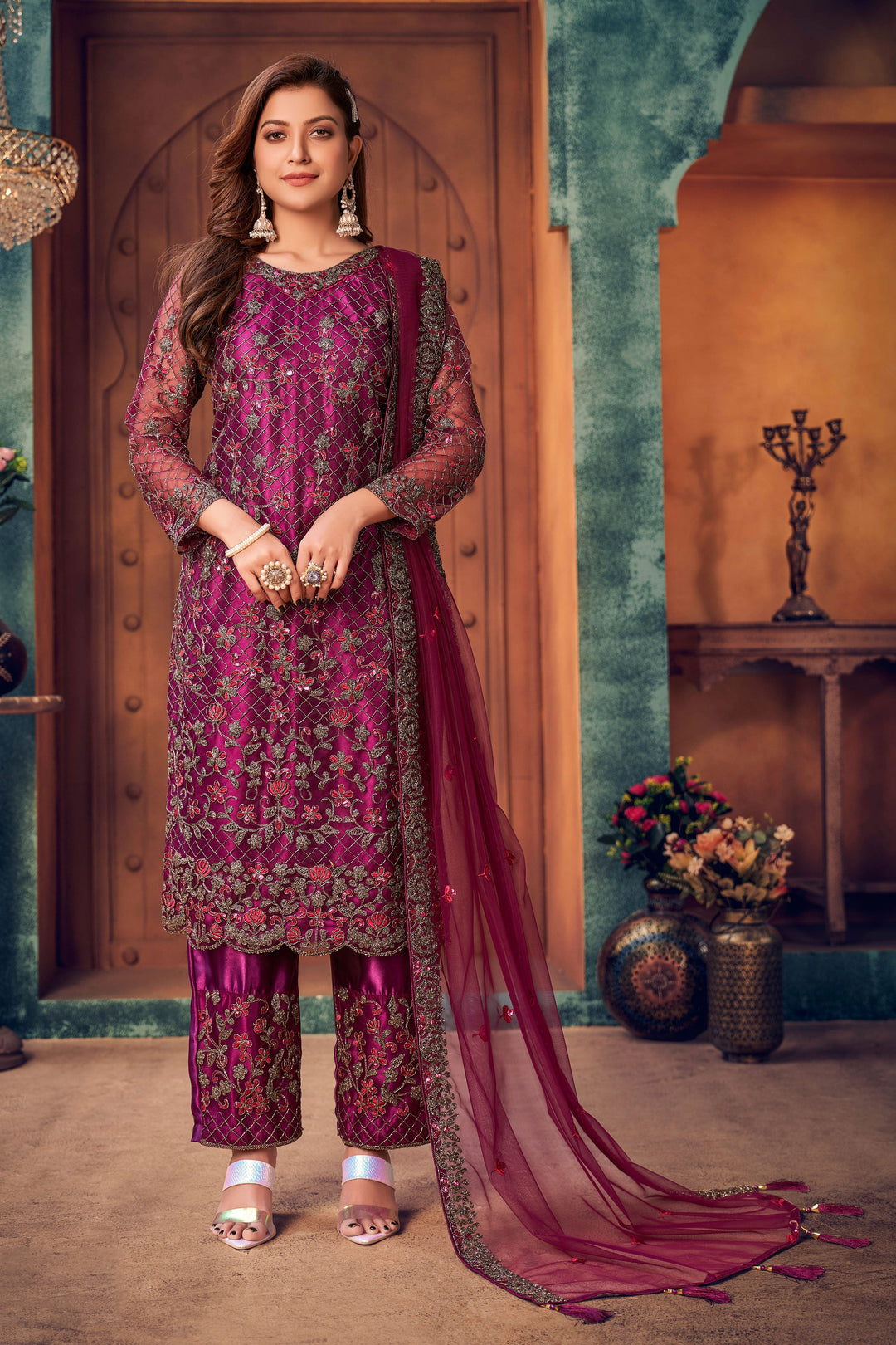 Vibrant magenta salwar kameez for women, USA festive attire for glamorous events.