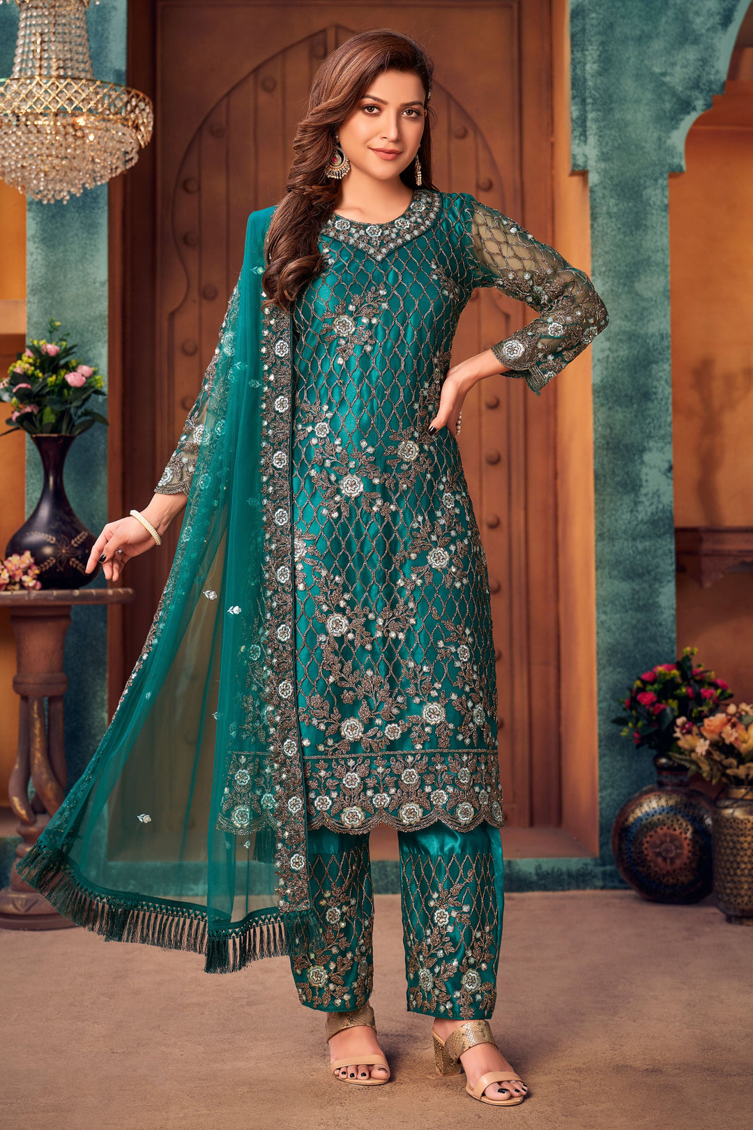 Teal green salwar kameez, traditional wear for USA women, perfect for festive gatherings.