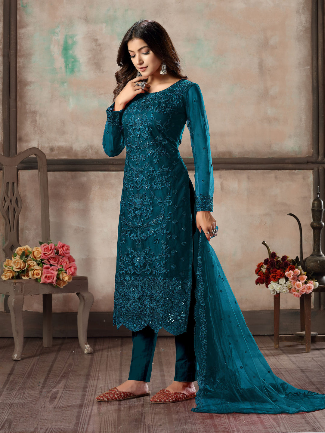 Designer teal blue salwar kameez set for women, ideal for formal occasions.