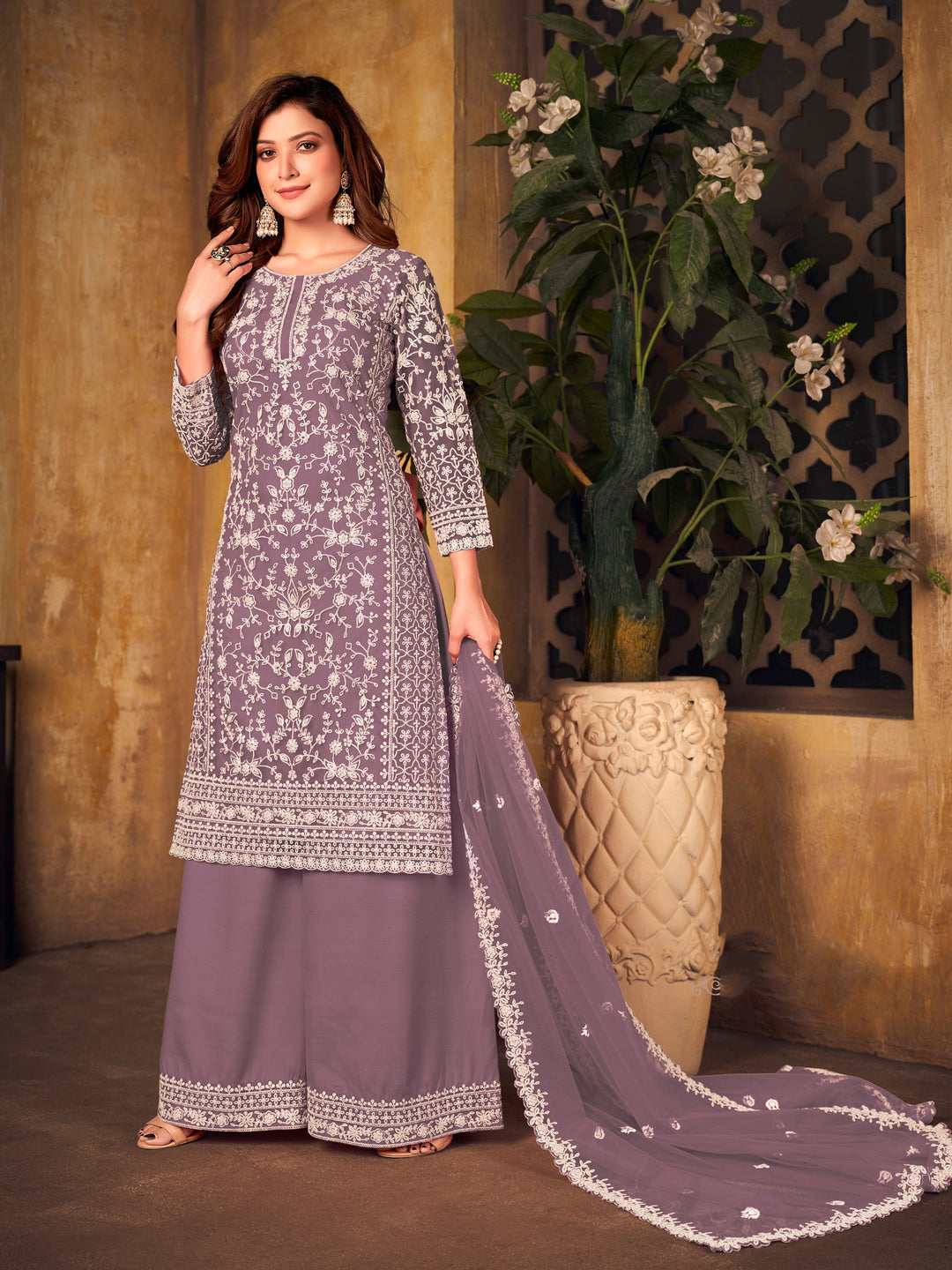 Dusty purple salwar kameez, USA women's traditional attire for celebrations.