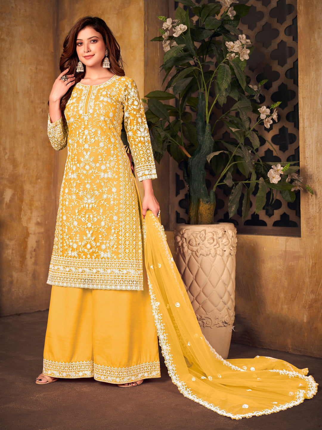 Yellow salwar kameez, USA women's attire for festive occasions and gatherings.