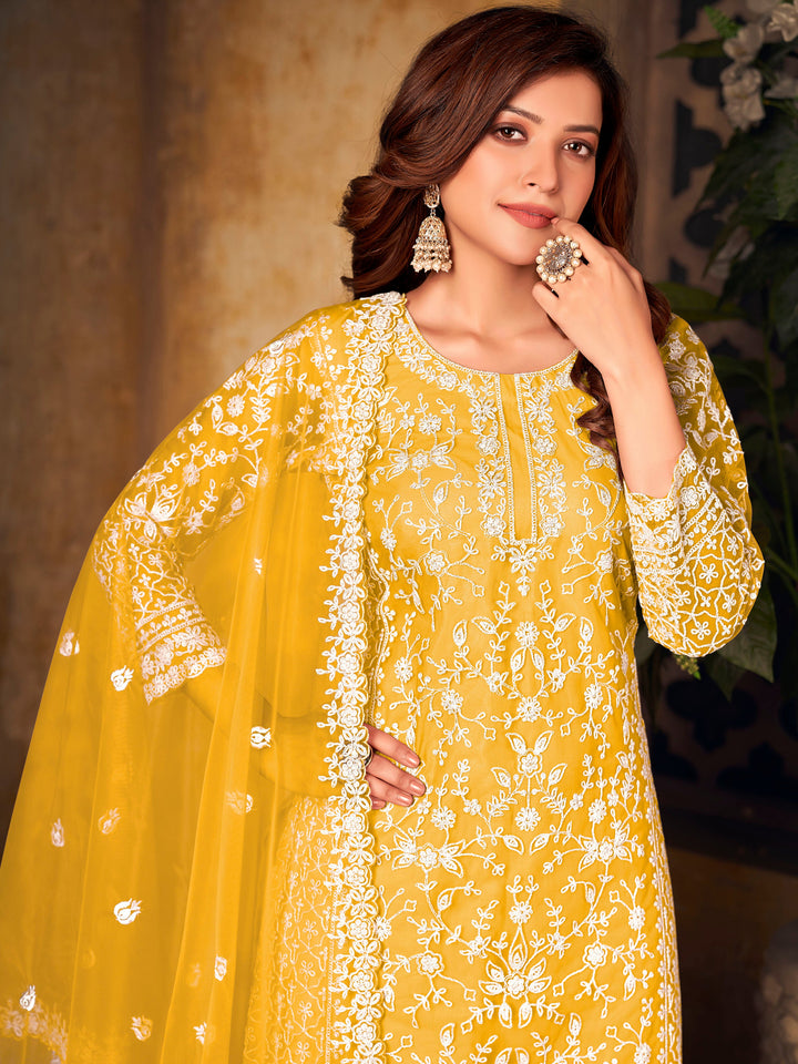 Festive yellow salwar kameez, USA ethnic wear, vibrant traditional attire for women.