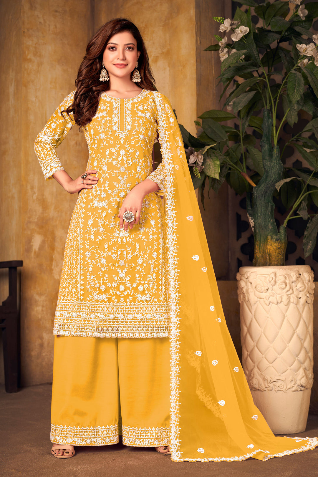 Vibrant yellow salwar kameez, festive ethnic wear for USA women, ideal for celebrations.