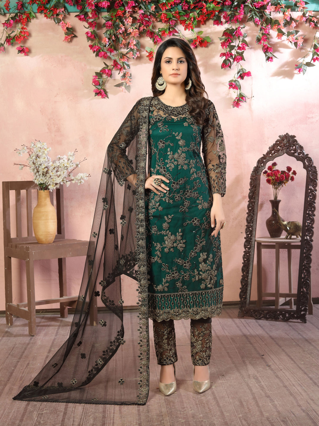 Stylish Rama green salwar kameez set for women, ideal for cultural celebrations.