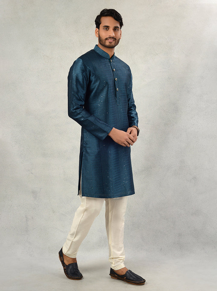 Elegant teal blue kurta with intricate embroidery, perfect for USA events.