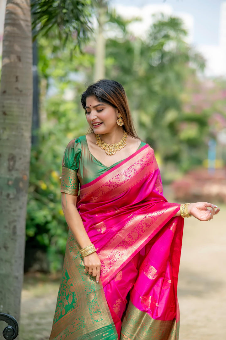 Bright Pink Banarasi Katan Silk Pattu Saree with zari weaving patterns and a contrasting zari pallu, perfect for festive occasions.