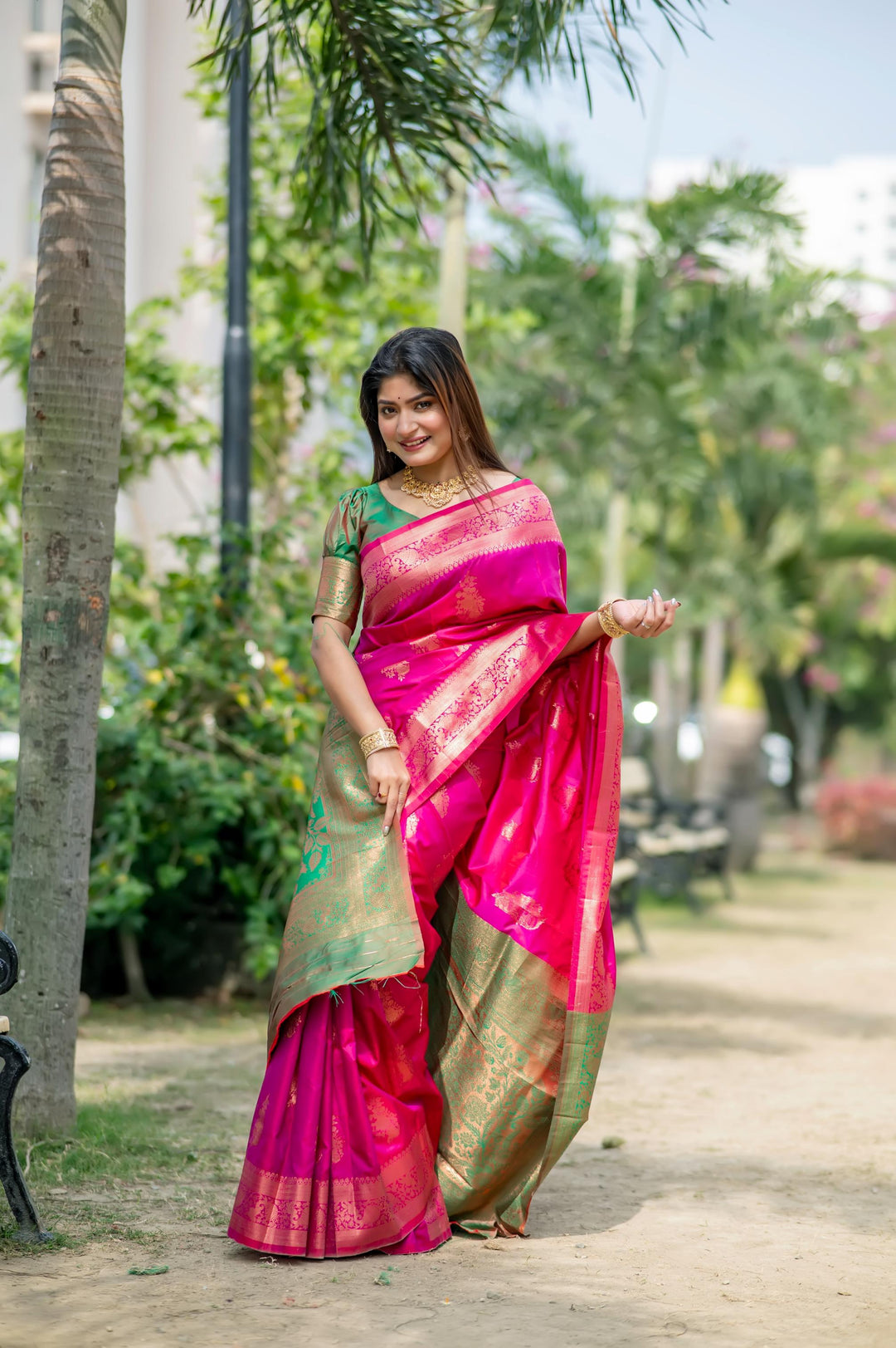 Elegant Bright Pink Indian Saree with traditional zari weaving and a luxurious contrast zari pallu for Indian weddings and celebrations.