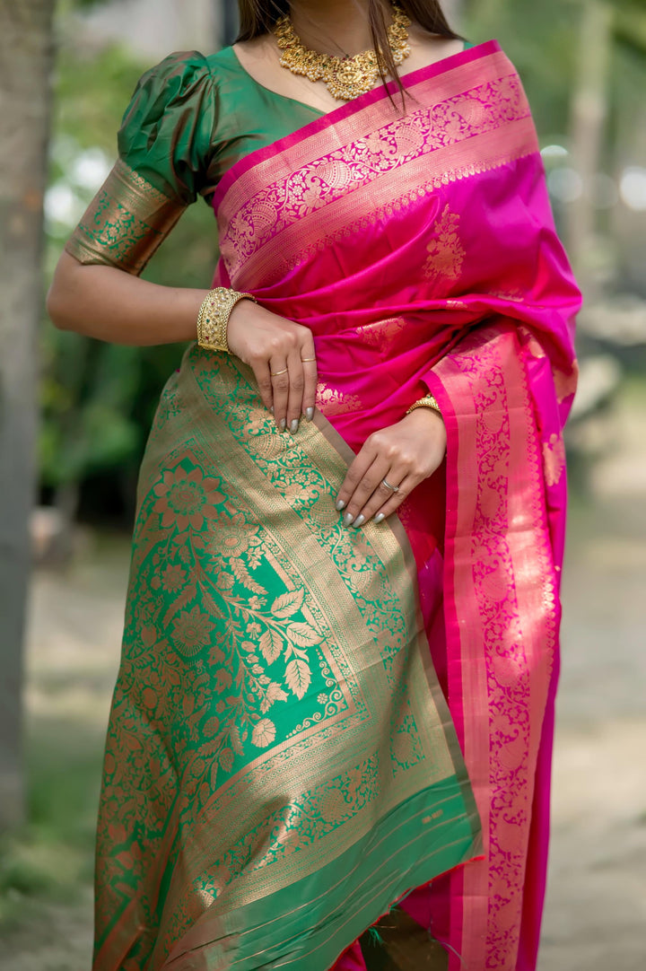 Latest Bright Pink Indian Sadi in soft Banarasi Katan silk, adorned with exquisite zari work for an elegant traditional look.