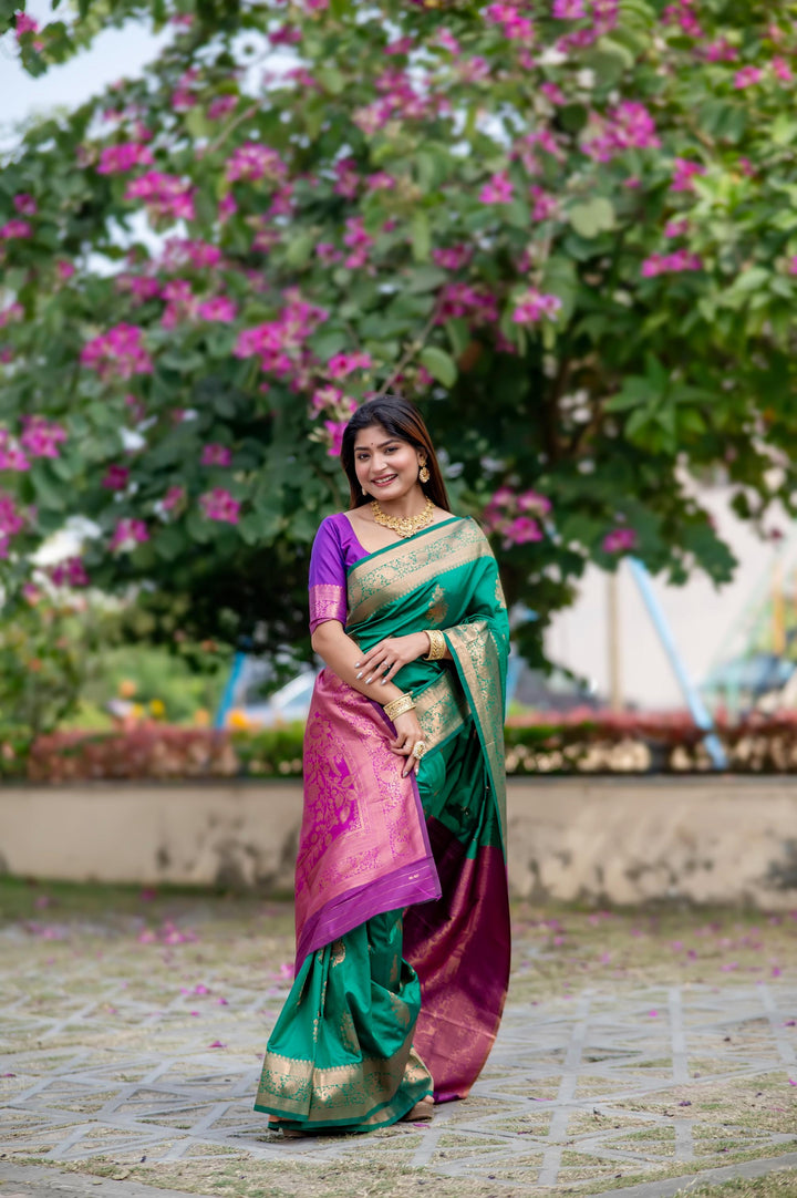 Traditional Green Indian Saree with rich zari work, perfect for festive celebrations and Indian weddings.