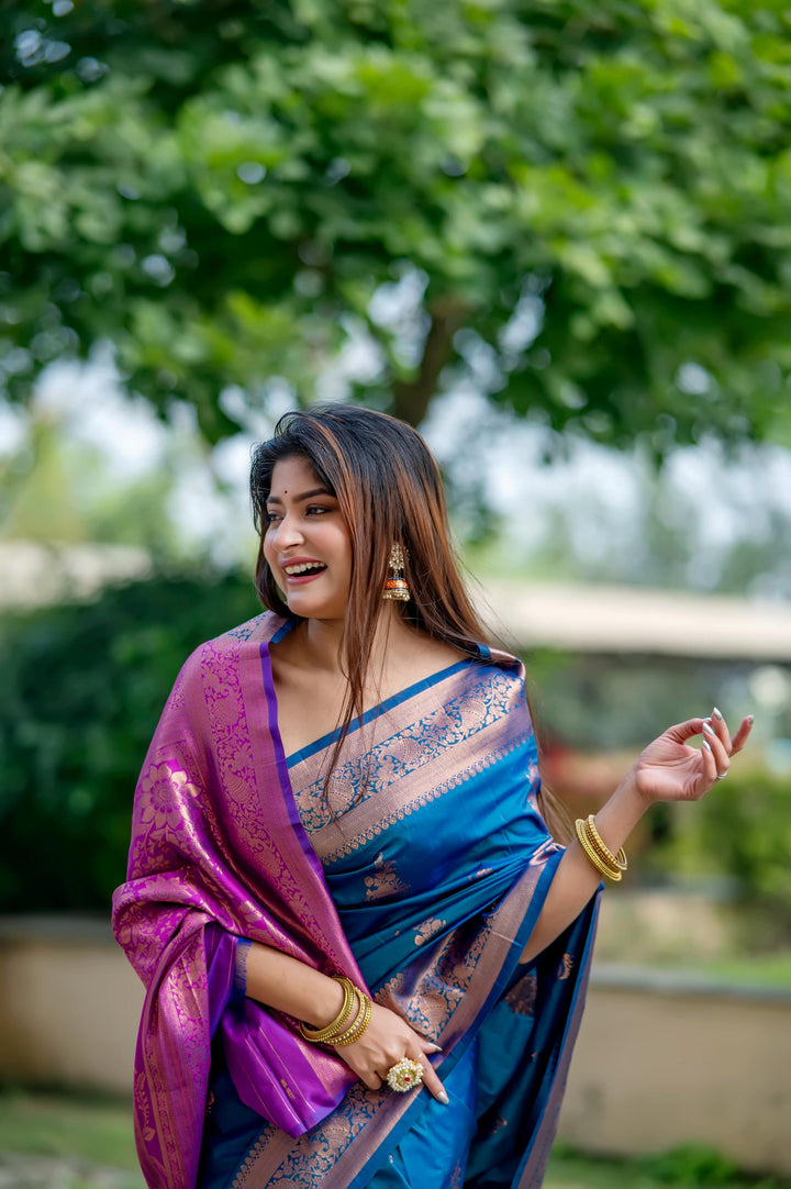 Dark Blue Banarasi Katan Silk Pattu Saree with stunning zari weaving patterns and a contrasting zari pallu, perfect for weddings.