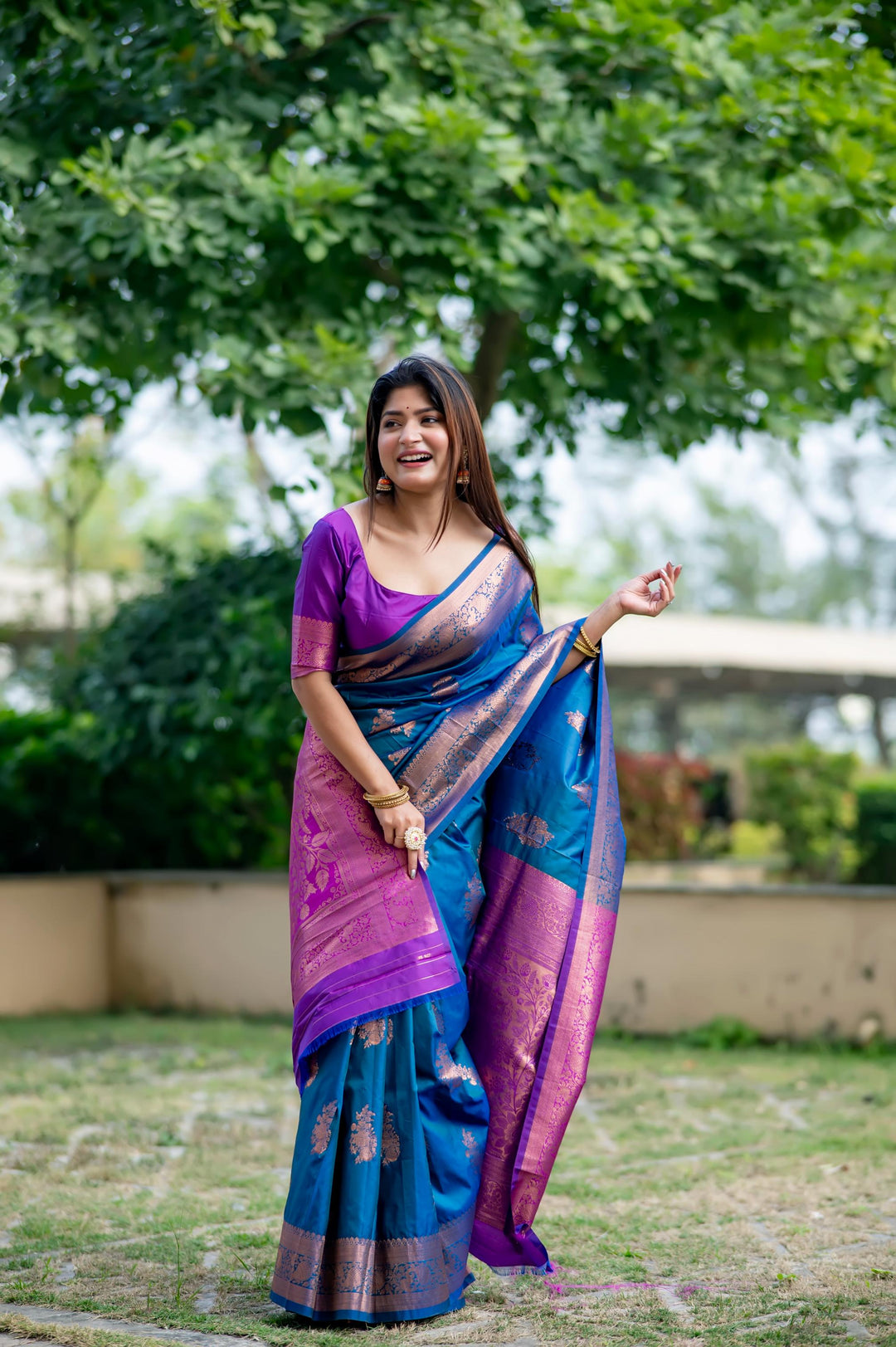 Designer Dark Blue Indian Sari with intricate zari weaving, ideal for festive occasions and cultural events.