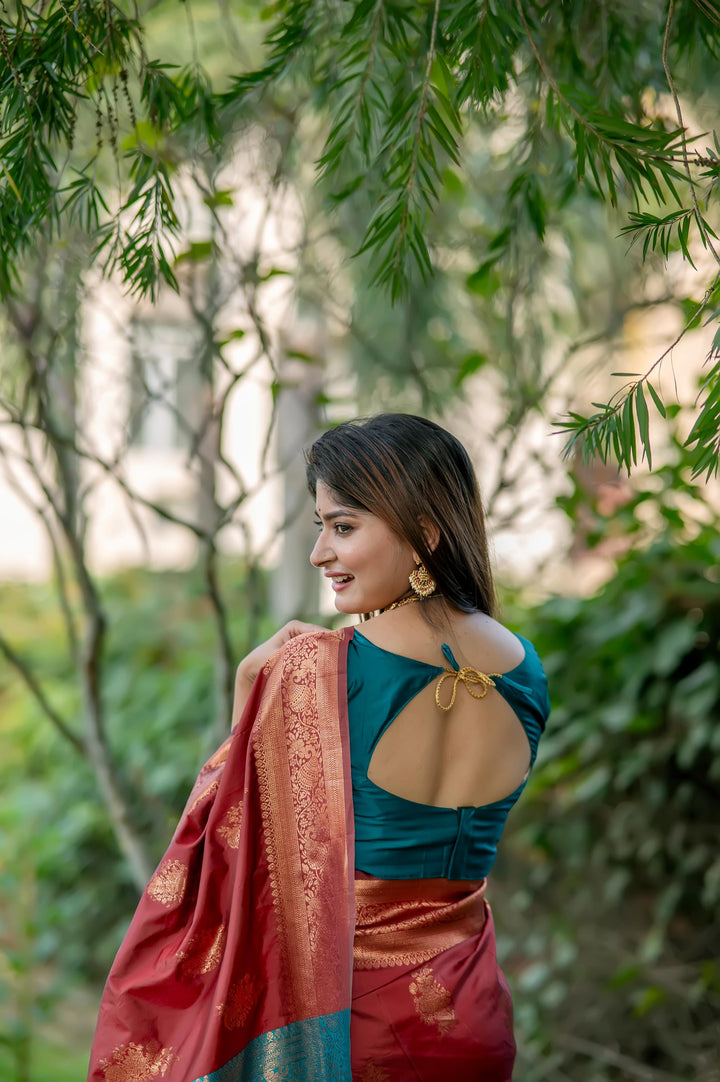 Red Banarasi Katan Silk Pattu Saree with beautiful zari weaving and a contrast zari pallu, ideal for traditional celebrations.