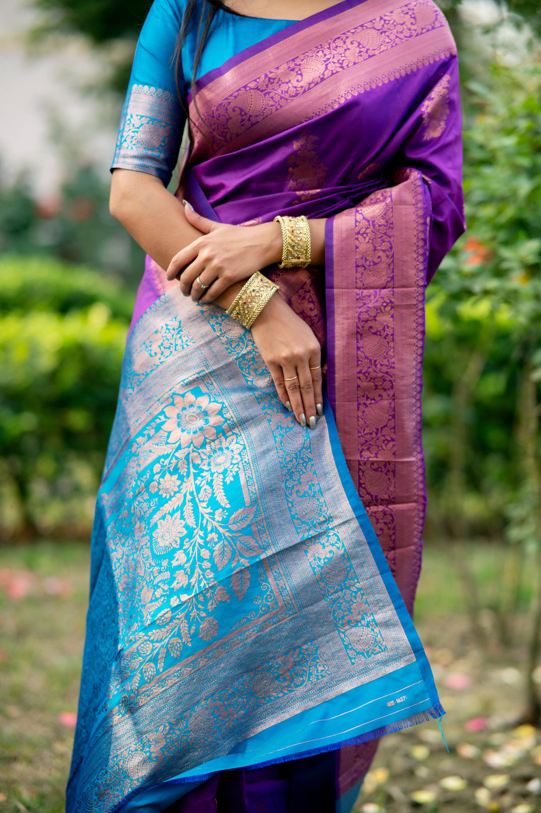 Traditional Purple Indian Saree with intricate zari patterns and a luxurious pallu for a festive and elegant look.