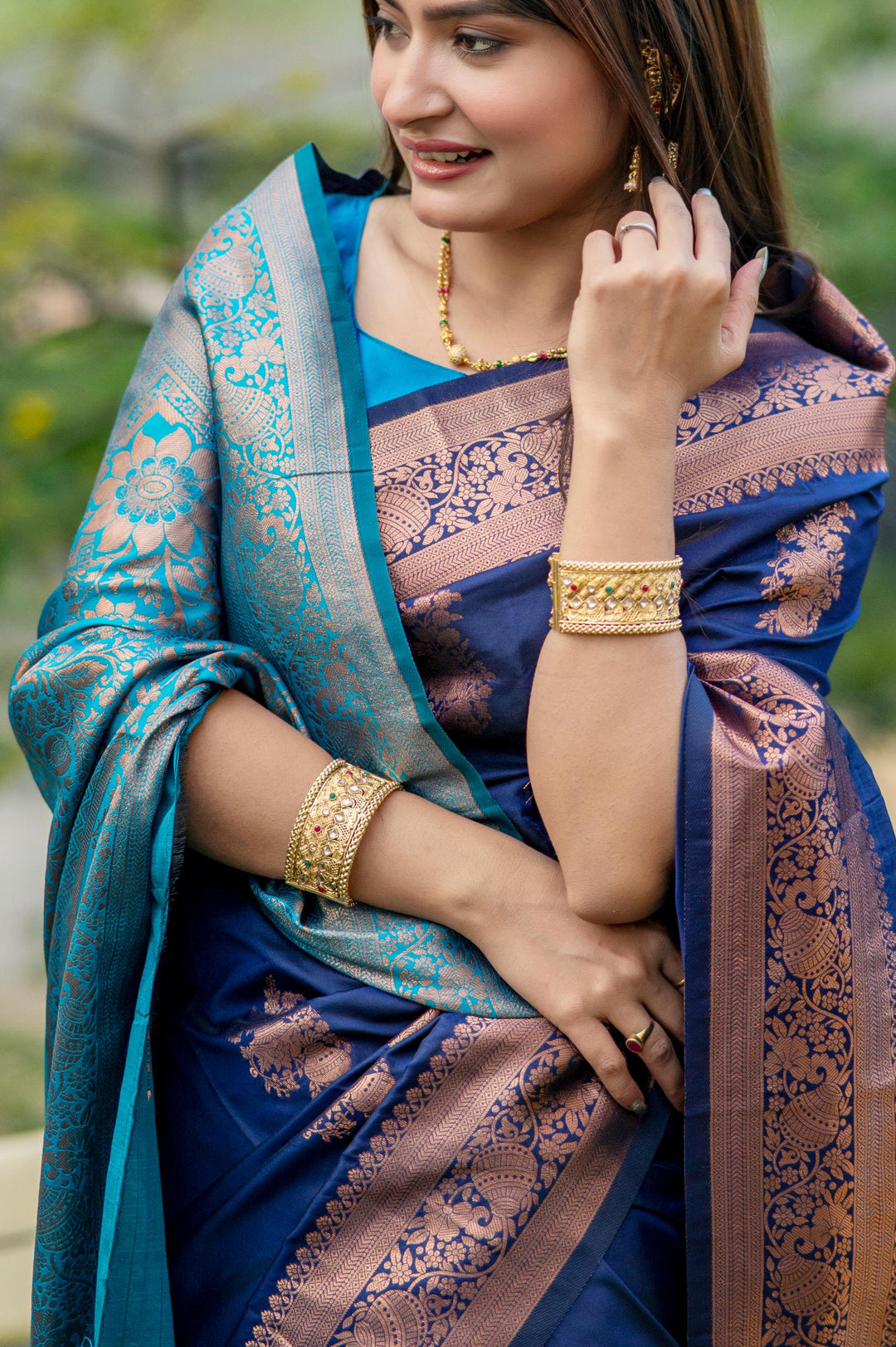 Latest Navy Blue Indian Saadi made from Banarasi Katan silk with beautiful zari work, perfect for festive occasions.