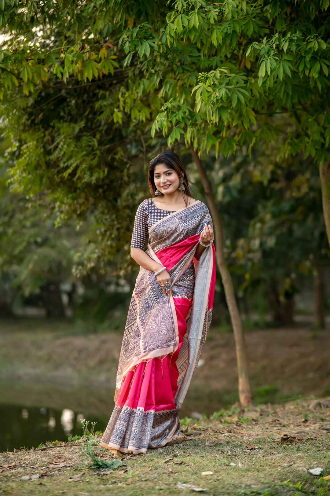 Gorgeous deep yellow soft tussar silk saree with detailed Madhubani prints and chic tassels, perfect for festivals.