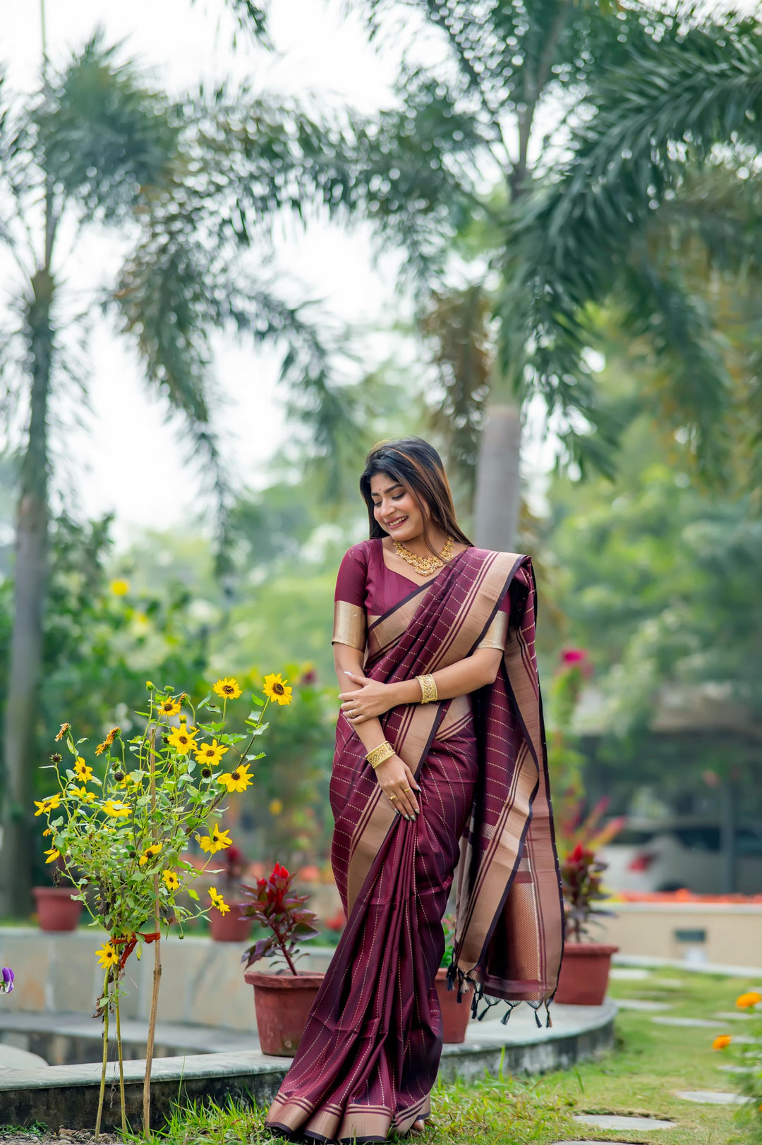 Stunning dark-green Banarasi saree with beautiful zari work, perfect for traditional events and ceremonies.