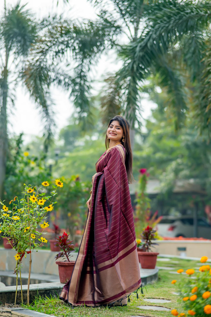 Magnificent dark-green Banarasi saree with ornate zari design, perfect for special occasions and festivities.